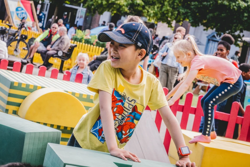 Children playing on foam blocks