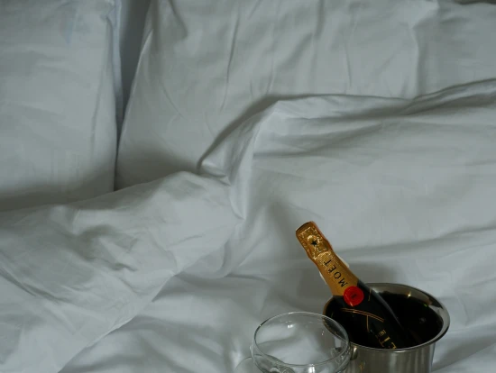 Stock Bed Champagne, Photo courtesy of Unsplash-Mary Skrynnikova