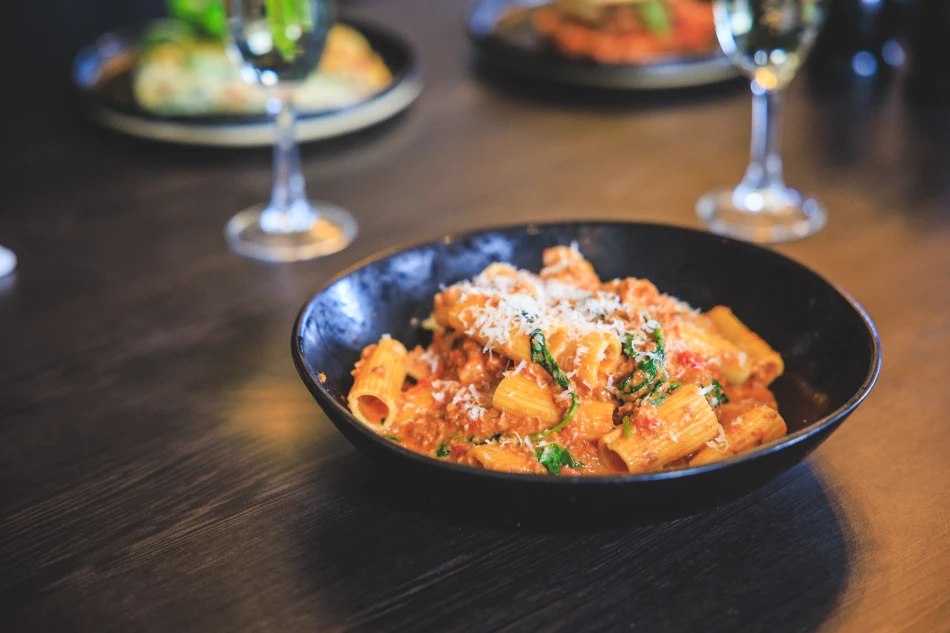 The Maven's Toulouse sausage bolognaise with rigatoni pasta